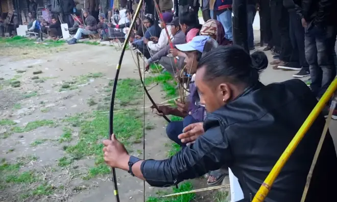 An archer is playing shillong teer in polo ground representing topic shillong teer result today